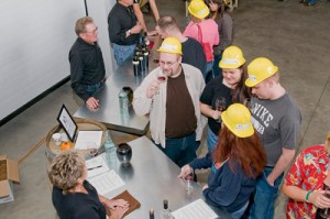 Sippers wear construction hats